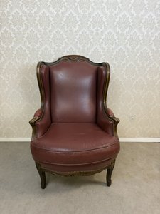 Kožené kreslo ušiak